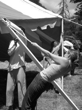 Big Top Goes Up. Miaya helps raise the circus tent used as a dining hall.